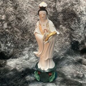 Elegant Porcelain Figurine with Gold Accents